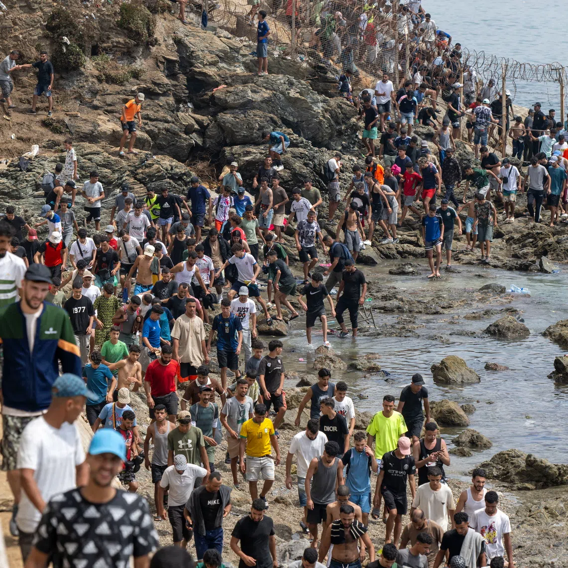 Spain said that of 72,000 people who entered the enclave from Morocco on July 30 and 31, all but 2,000 had returned