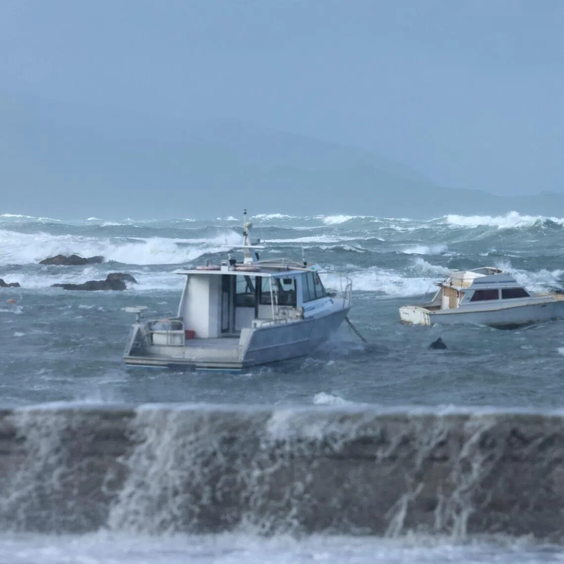Stormy seas pound the coastline in the Wellington suburb of Island Bay on June 9, 2026.