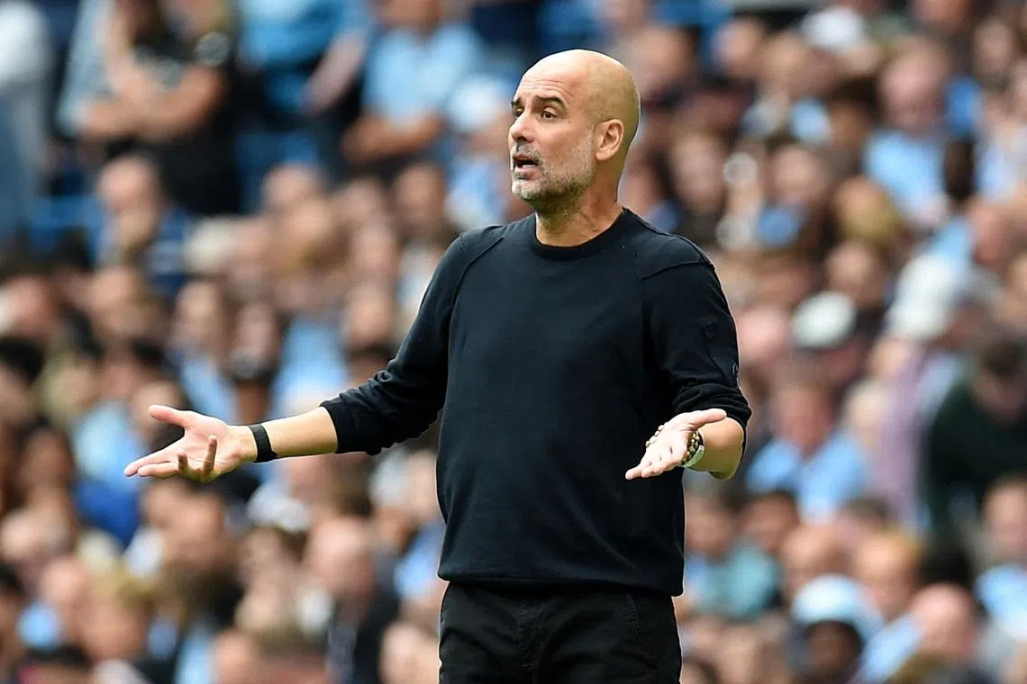 Soccer Football - Premier League - Manchester City v Tottenham Hotspur - Etihad Stadium, Manchester, Britain - August 23, 2025  Manchester City manager Pep Guardiola reacts REUTERS/Peter Powell