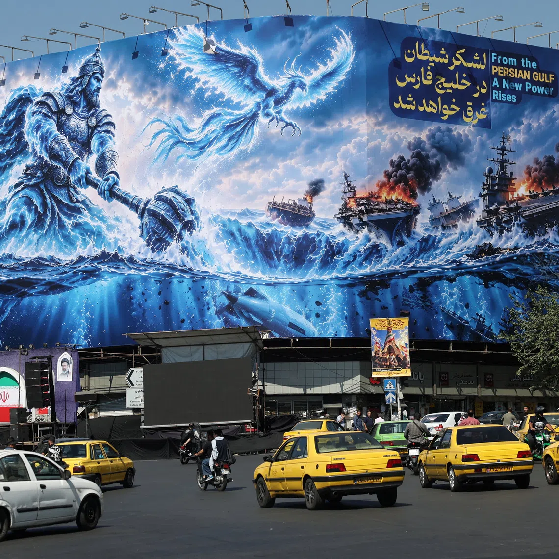 People drive past a billboard about the Strait of Hormuz, on a building in Tehran, Iran, September 16, 2026. Majid Asgaripour/WANA (West Asia News Agency) via REUTERS