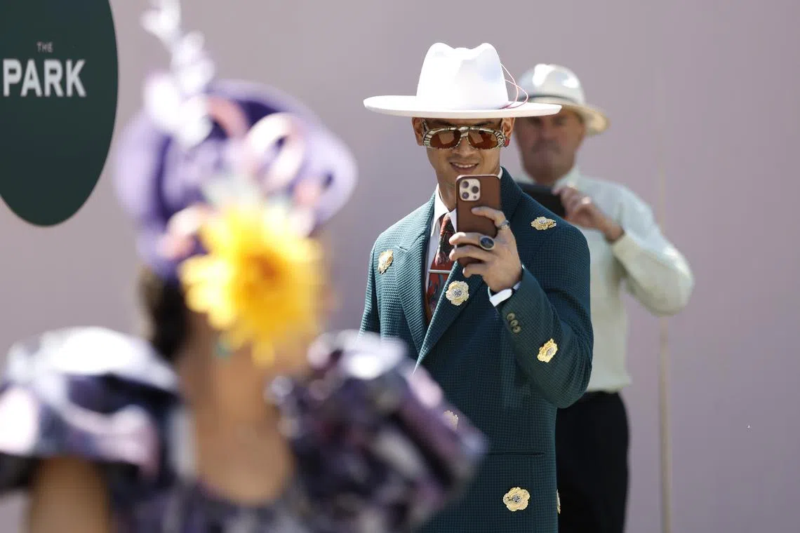 Participants in the 'Fashions on the Field' are seen during Melbourne Cup Day at Flemington Racecourse in Melbourne, Australia on Nov 7, 2023.  