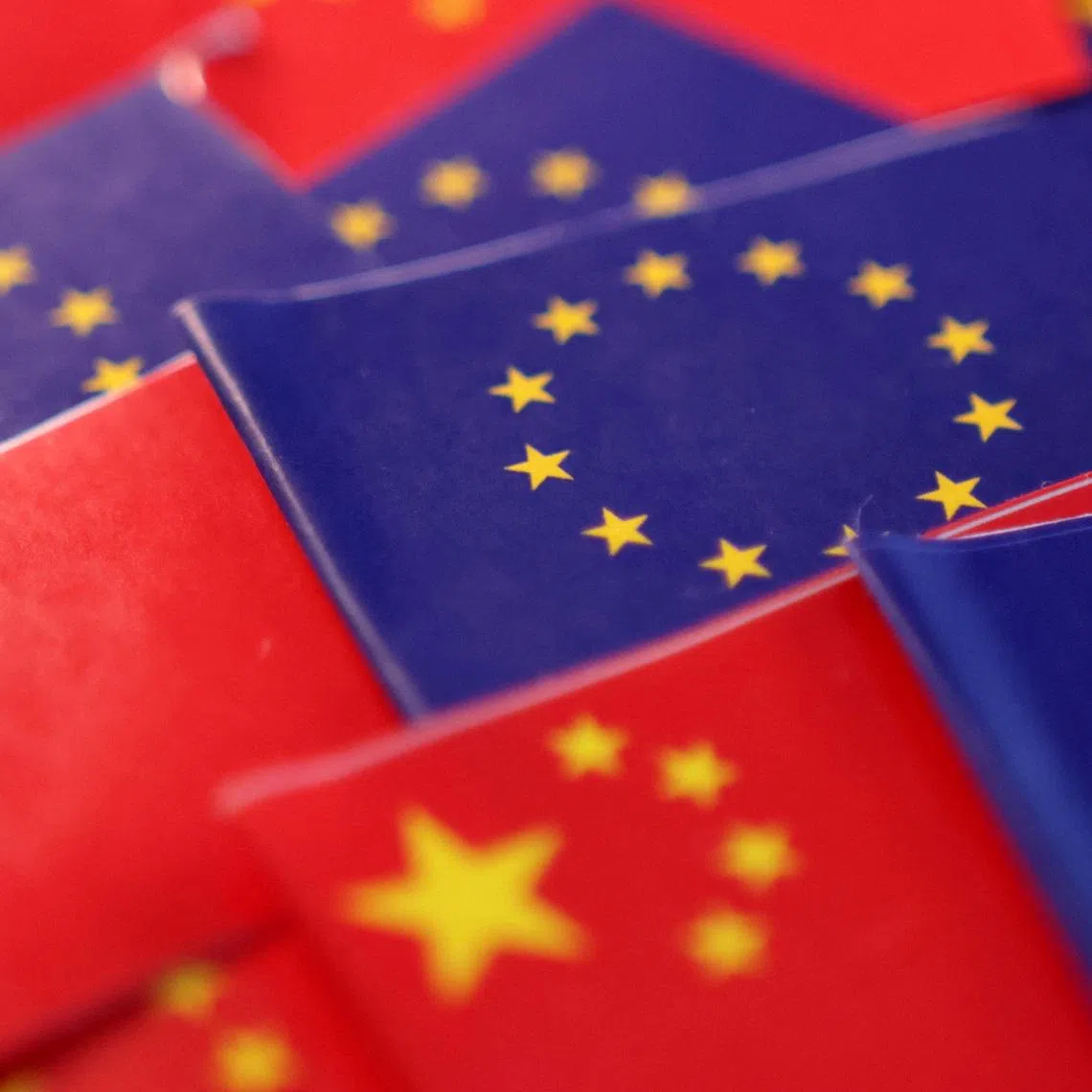 EU and Chinese flags are seen in this illustration taken, March 20, 2025. REUTERS/Dado Ruvic/Illustration
