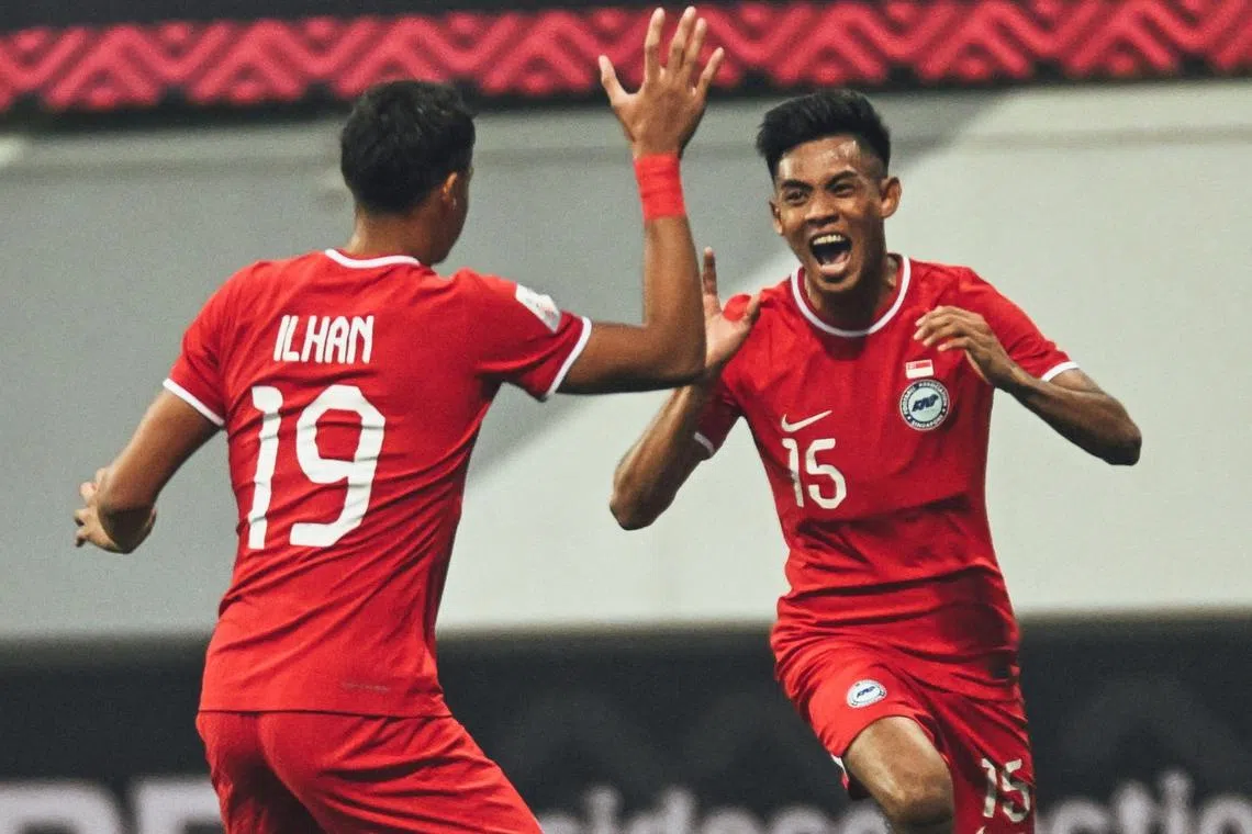 Shah Shahiran (right) celebrating with Ilhan Fandi after scoring Singapore's second goal in the 3-2 win over Myanmar on Saturday.