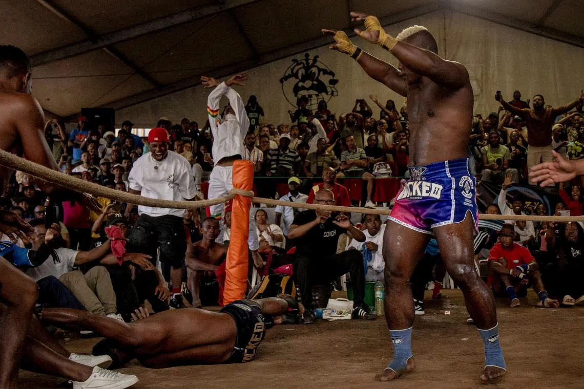 Moraingy fighters battle in the \"Moraingy Iarivo\" sports event, a traditional Madagascan martial art fighting competition that was practised as training for war and as an initiation rite marking the passage to adulthood, at a stadium in Antananarivo, Madagascar April 6, 2025. REUTERS/Zo Andrianjafy/File Photo