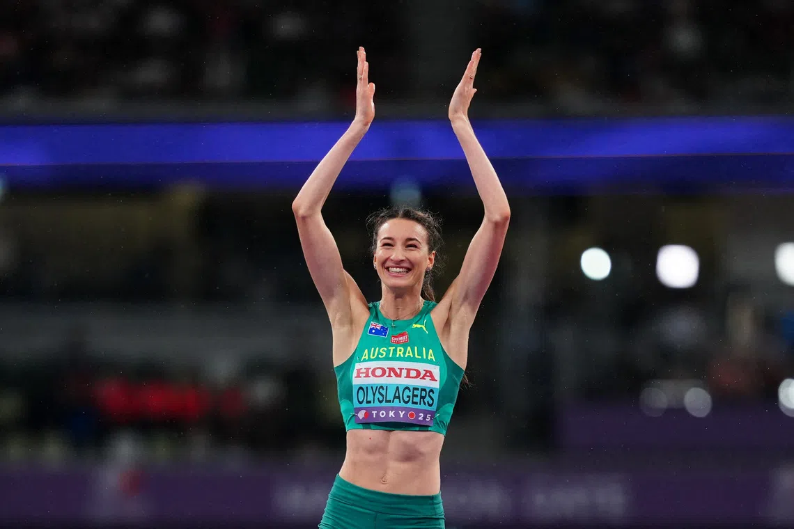 World Athletics Championships Tokyo 2025 - Women's High Jump Final - Japan National Stadium, Tokyo, Japan - September 21, 2025 Australia's Nicola Olyslagers celebrates after winning gold in the final REUTERS/Aleksandra Szmigiel