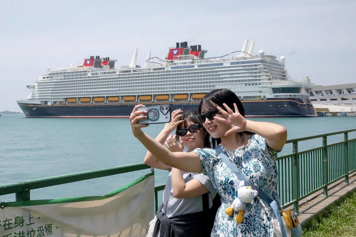 The Disney Adventure cruise ship docked at Marina Bay Cruise Centre Singapore sets off on its first public sailing on March 10.