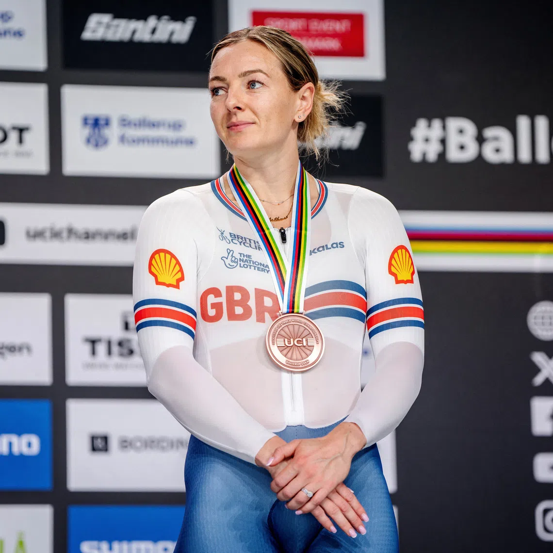 Cycling - UCI Track Cycling World Championships - Ballerup Super Arena, Ballerup, Denmark - October 19, 2024 Bronze medallists Britain's Katy Marchant celebrates on the podium after the women's 500m time trial final  Mads Claus Rasmussen/Ritzau Scanpix via REUTERS