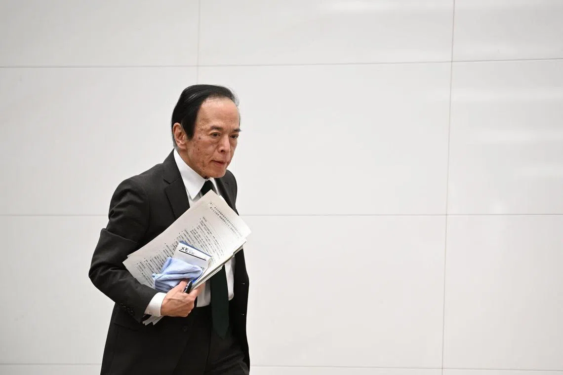 Kazuo Ueda, governor of the Bank of Japan (BOJ), leaves following a news conference at the central bank's headquarters in Tokyo, Japan, on Tuesday, March 19, 2024. The BOJ ended the most aggressive monetary stimulus program in modern history, scrapping the world's last negative interest rate and a raft of unconventional tools, while leaving the course of additional hikes unclear. Photographer: Akio Kon/Bloomberg