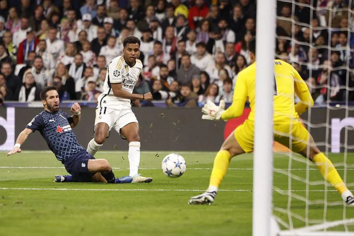 Soccer Football - Champions League - Group C - Real Madrid v S.C. Braga - Santiago Bernabeu, Madrid, Spain - November 8, 2023 Real Madrid's Rodrygo shoots at goal REUTERS/Juan Medina