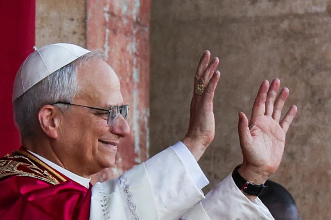Newly elected Pope Leo XIV, Cardinal Robert Prevost of the United States, appears at the balcony of St. Peter's Basilica at the Vatican, May 8, 2025. REUTERS/Stoyan Nenov