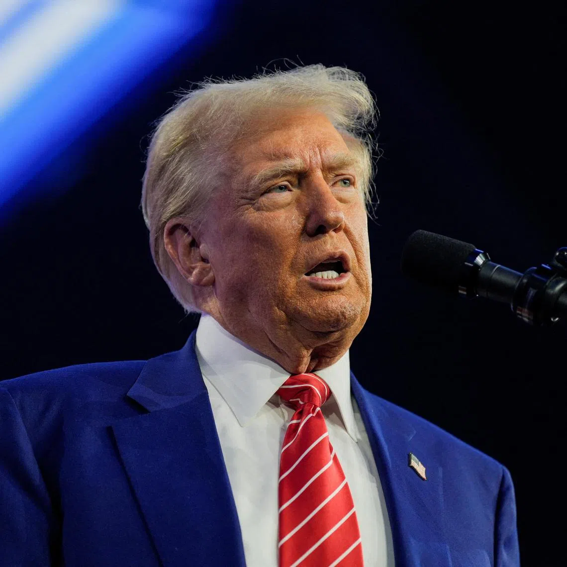 FILE PHOTO: U.S. President-elect Donald Trump speaks at Turning Point USA's AmericaFest in Phoenix, Arizona, U.S., December 22, 2024.  REUTERS/Cheney Orr/File Photo