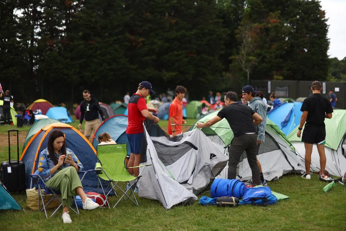 A camping trip? No, just fans in The Queue for tickets at Wimbledon.