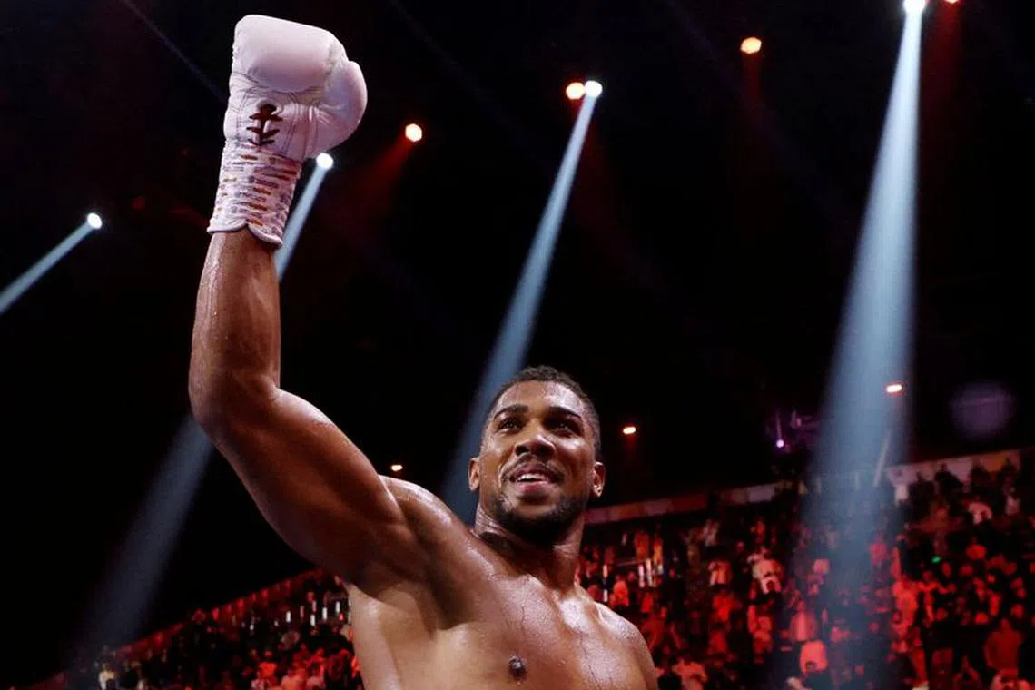 Boxing - Anthony Joshua v Otto Wallin - Kingdom Arena, Riyadh, Saudi Arabia - December 24, 2023 Anthony Joshua celebrates after winning his fight against Otto Wallin REUTERS/Ahmed Yosri