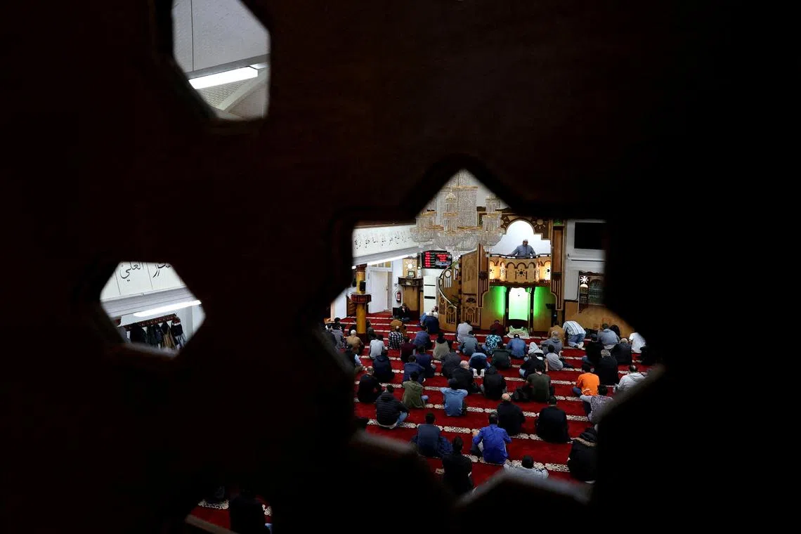 FILE PHOTO: Muslims attend Friday prayers at the Dar Assalam mosque in Berlin, Germany, October 13, 2023, during the ongoing conflict between Israel and the Palestinian Islamist group Hamas.      REUTERS/Liesa Johannssen/File Photo