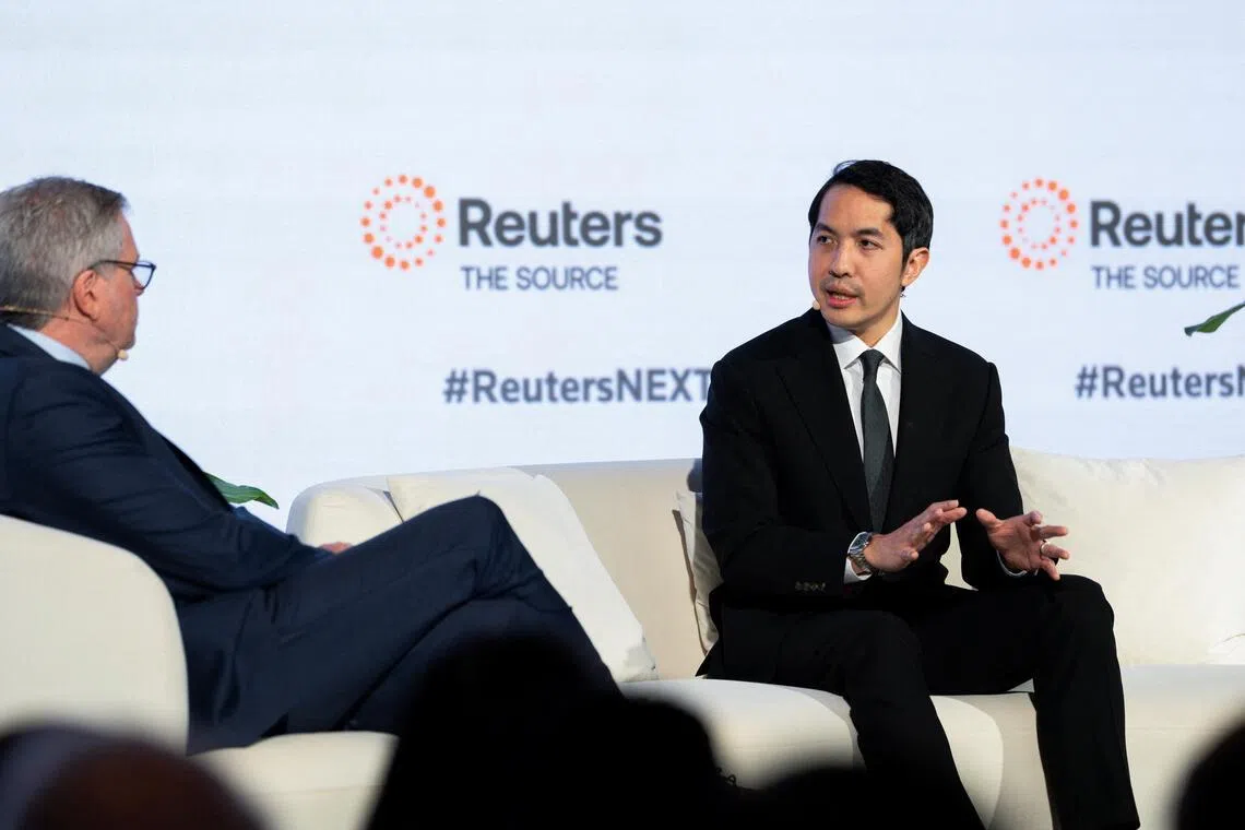 Thailand’s Vice-Minister of Finance Santitarn Sathirathai (right) speaks during an interview at the Reuters NEXT conference in Singapore on July 9.