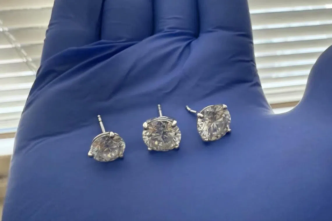 Diamond earrings recovered from the suspect, after he swallowed them.