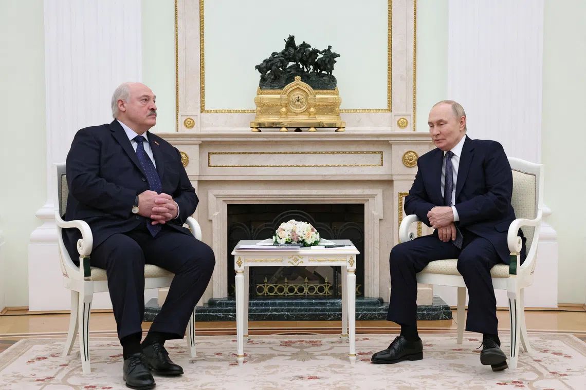 Russian President Vladimir Putin and Belarusian President Alexander Lukashenko attend a meeting at the Kremlin in Moscow, Russia September 26, 2025. REUTERS/Ramil Sitdikov/Pool