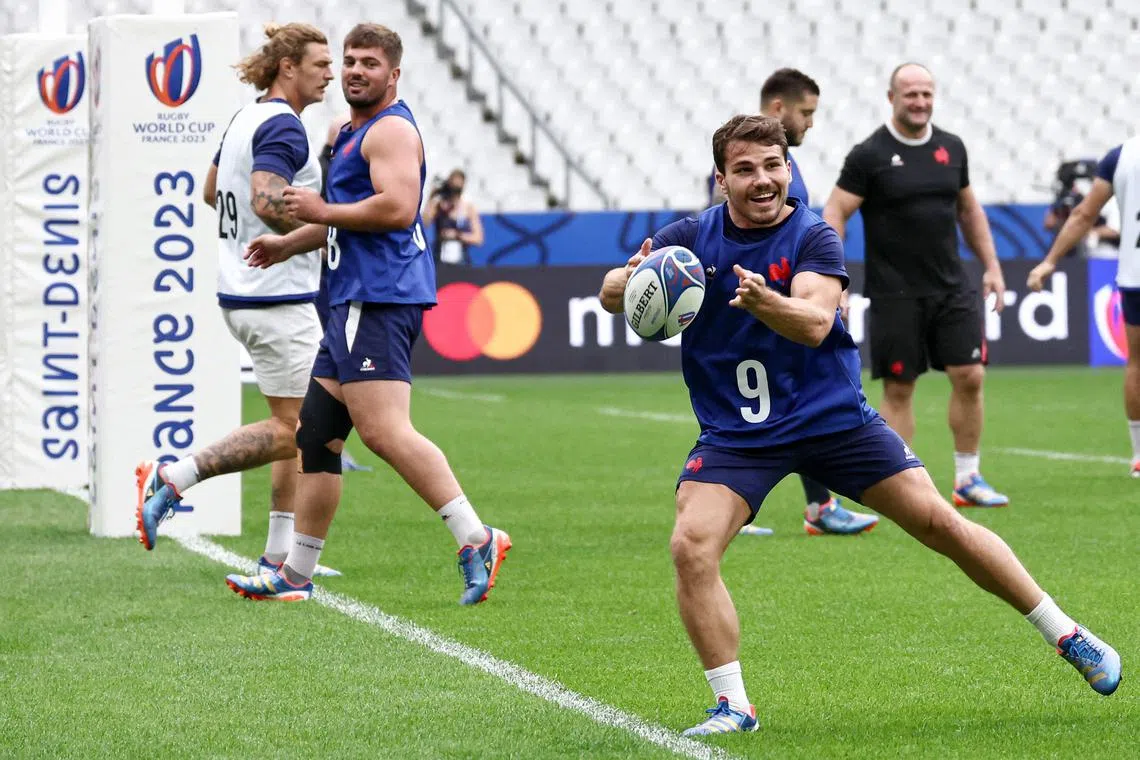 France's scrum-half Antoine Dupont passing the ball during a training session at the Stade de France, in Saint-Denis, on Friday.