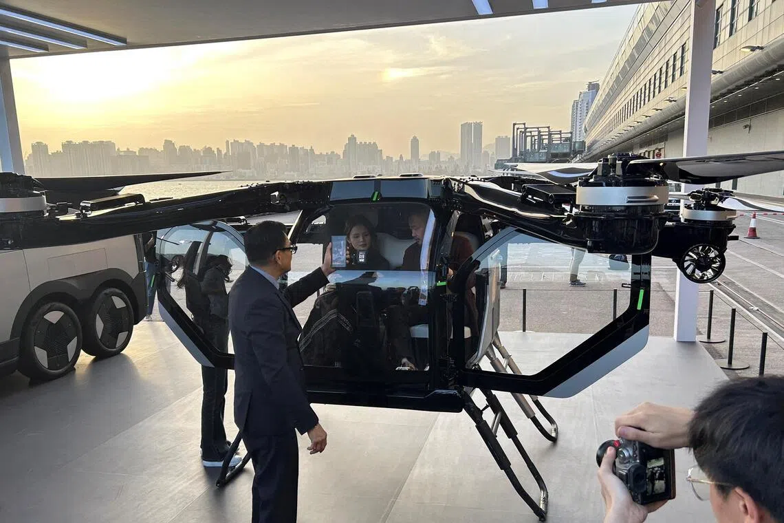 Chinese electric vehicle maker Xpeng displays a concept flying car at an event by the Victoria Harbour in Hong Kong on April 15.