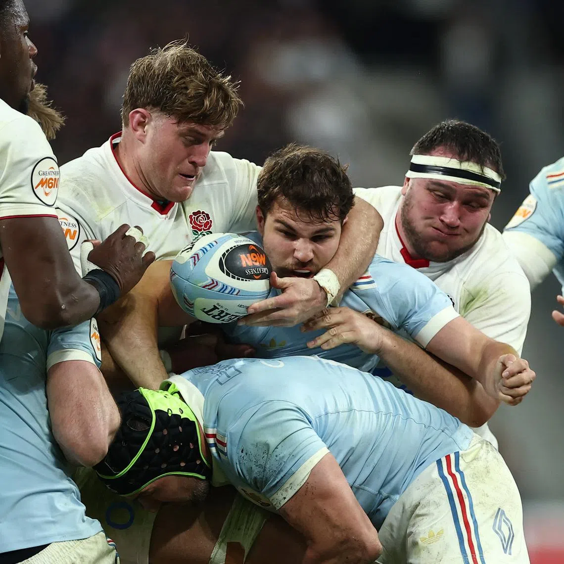 Rugby Union - Six Nations Championship - France v England - Stade de France, Saint-Denis, France - March 14, 2026 France's Antoine Dupont in action with England's Alex Coles and Jamie George REUTERS/Gonzalo Fuentes