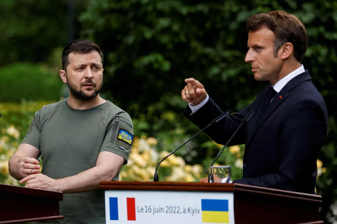 Ukrainian President Volodymyr Zelensky (left) with French President Emmanuel Macron, at a news conference in Kyiv, in June 2022.