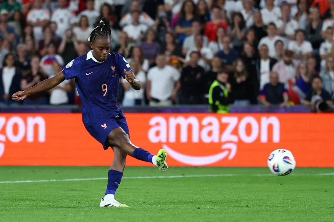FILE PHOTO: Soccer Football - UEFA Women's Euro 2025 - Quarter Final - France v Germany - St. Jakob-Park, Basel, Switzerland - July 19, 2025  France's Melvine Malard scores a penalty during a penalty shootout REUTERS/Matthew Childs/File Photo