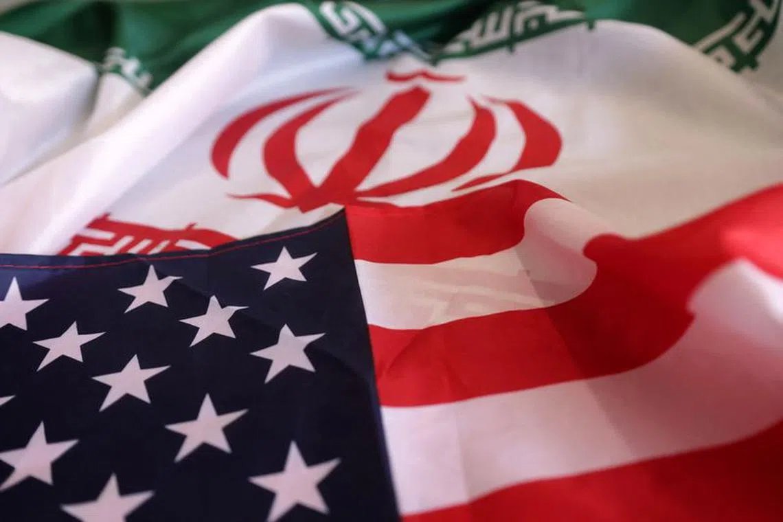 USA and Iranian flags are seen in this illustration taken, September 8, 2022. REUTERS/Dado Ruvic/Illustration/File Photo