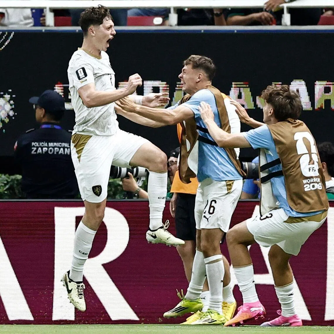 Czech defender Ladislav Krejci (left) celebrating with teammates after scoring his team's first goal during the match against South Korea on June 11. 