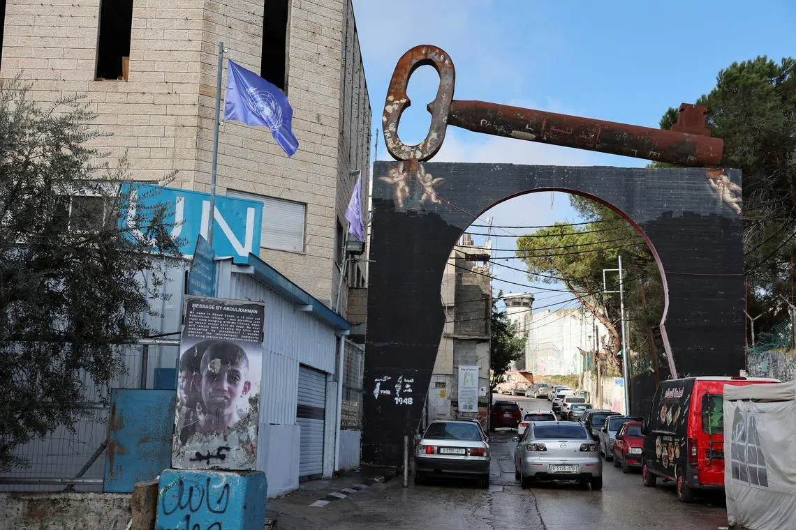 FILE PHOTO: The Palestinian key of return is pictured near a UNRWA center in the Aida refugee camp in Bethlehem in the Israeli-occupied West Bank, February 5, 2024. REUTERS/Mussa Qawasma/File Photo