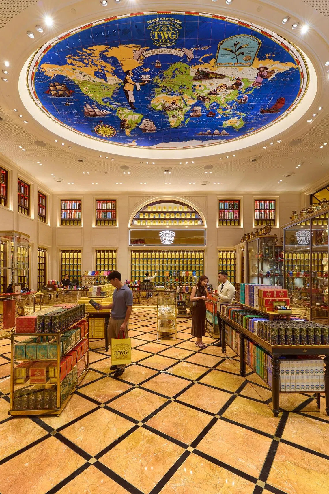 The flagship’s hand-painted world tea map ceiling.