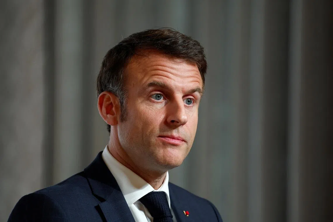 French President Emmanuel Macron attends a press conference at the end of the conference in support of Ukraine, with European leaders and government representatives, at the Elysee Palace in Paris, France, February 26, 2024. REUTERS/Gonzalo Fuentes/Pool