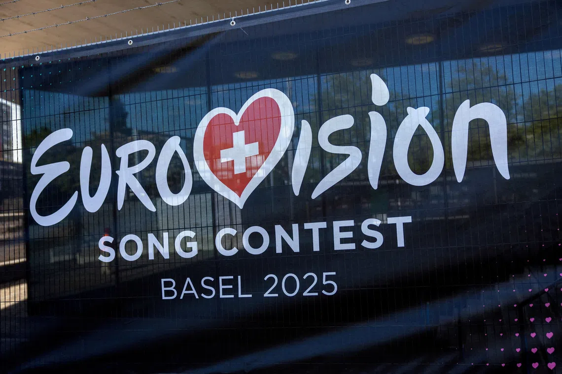 FILE PHOTO: A logo of the Eurovision Song Contest is seen in front of the St. Jakobshalle in Basel, Switzerland, May 1, 2025. REUTERS/Denis Balibouse//File Photo