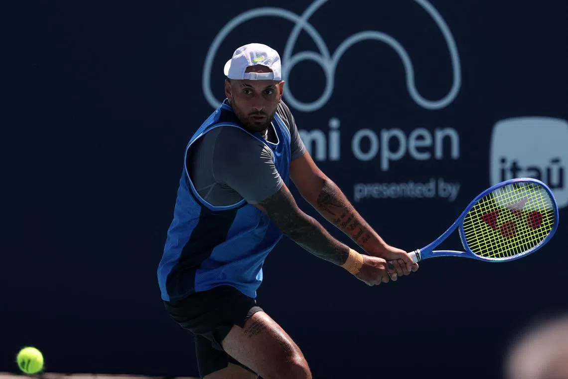 FILE PHOTO: Mar 21, 2025; Miami, FL, USA; Nick Kyrgios (AUS) hits a backhand against Karen Khachanov (not pictured) on day four of the Miami Open at Hard Rock Stadium. Mandatory Credit: Geoff Burke-Imagn Images/File Photo