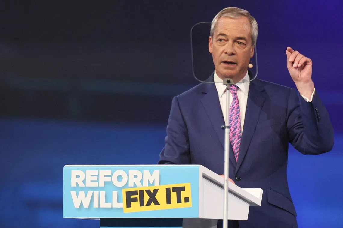 FILE PHOTO: British MP and Reform UK party leader Nigel Farage speaks during the party's local elections campaign launch at Utilita Arena Birmingham, in Birmingham, Britain, March 28, 2025. REUTERS/Isabel Infantes/ File Photo