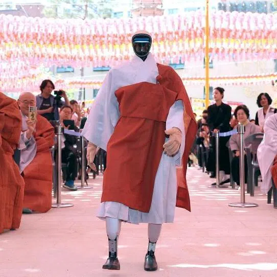 Gabi, a humanoid robot dressed as a Buddhist monk, attends an ordination ceremony at Jogye Temple in Seoul on May 6.