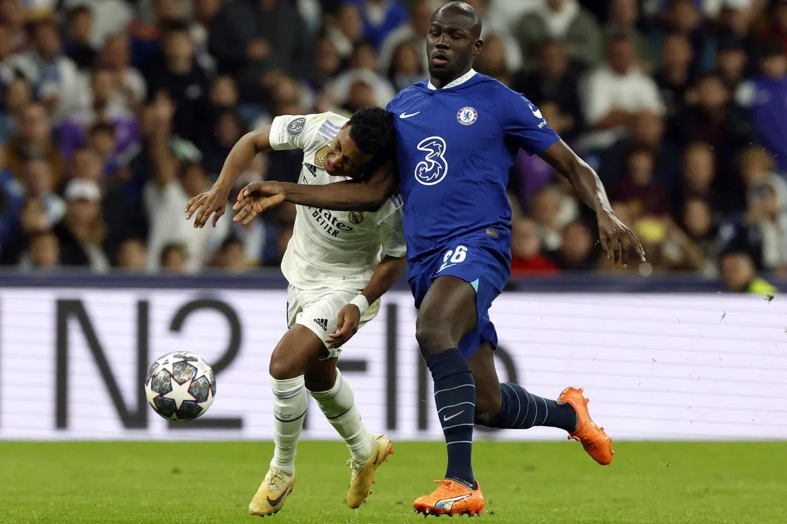 Real Madrid's Rodrygo (left) in action with Chelsea's Kalidou Koulibaly.
