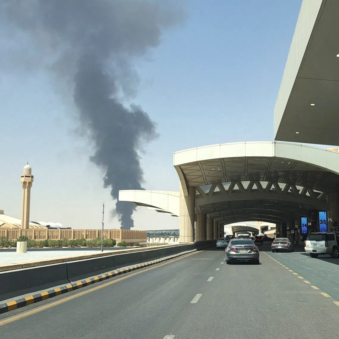 Large plume of black smoke rises from the fuel storage depot at King Khalid International Airport, in Riyadh, Saudi Arabia, September 19, 2026. Picture taken with a mobile phone. REUTERS/Stringer