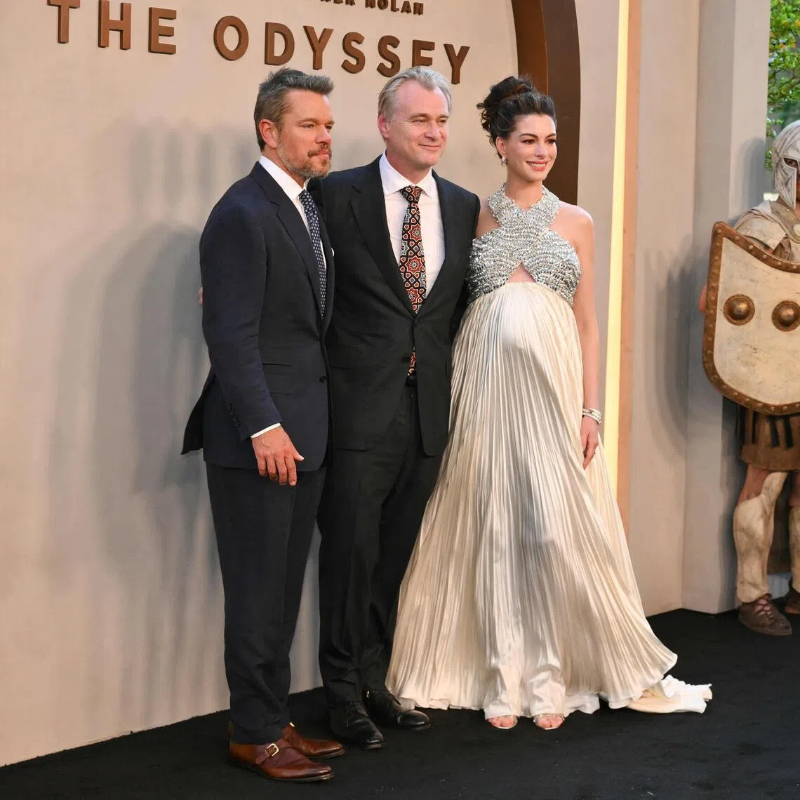 (From left) US actor Matt Damon, British-US director Christopher Nolan and US actress Anne Hathaway attend The Odyssey premiere at the AMC Lincoln Square in New York on July 14.