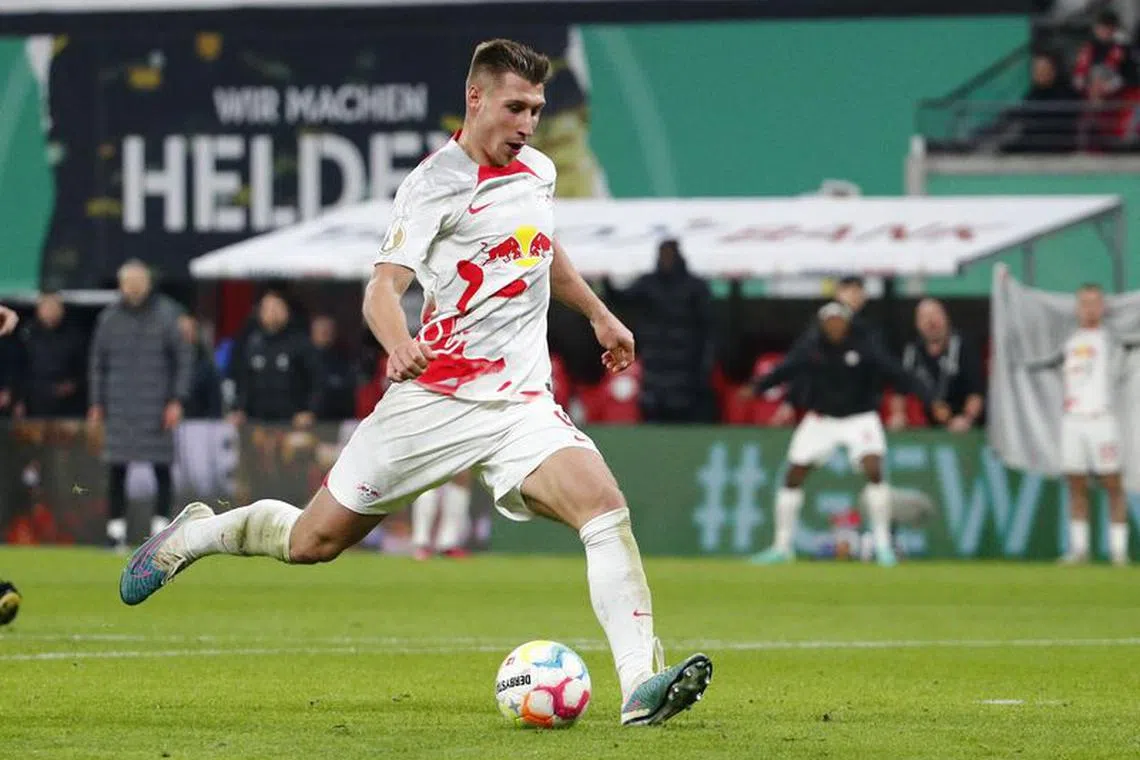 FILE PHOTO: Soccer Football - DFB Cup - Quarter Final - RB Leipzig v Borrusia Dortmund - Red Bull Arena, Leipzig, Germany - April 5, 2023  RB Leipzig's Willi Orban scores their second goal REUTERS/Karina Hessland/File photo