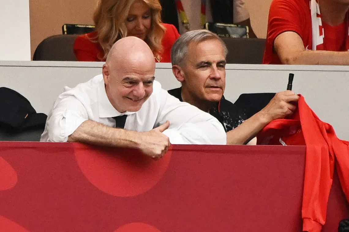Canada’s Prime Minister Mark Carney (right) and FIFA president Gianni Infantino at the World Cup.
