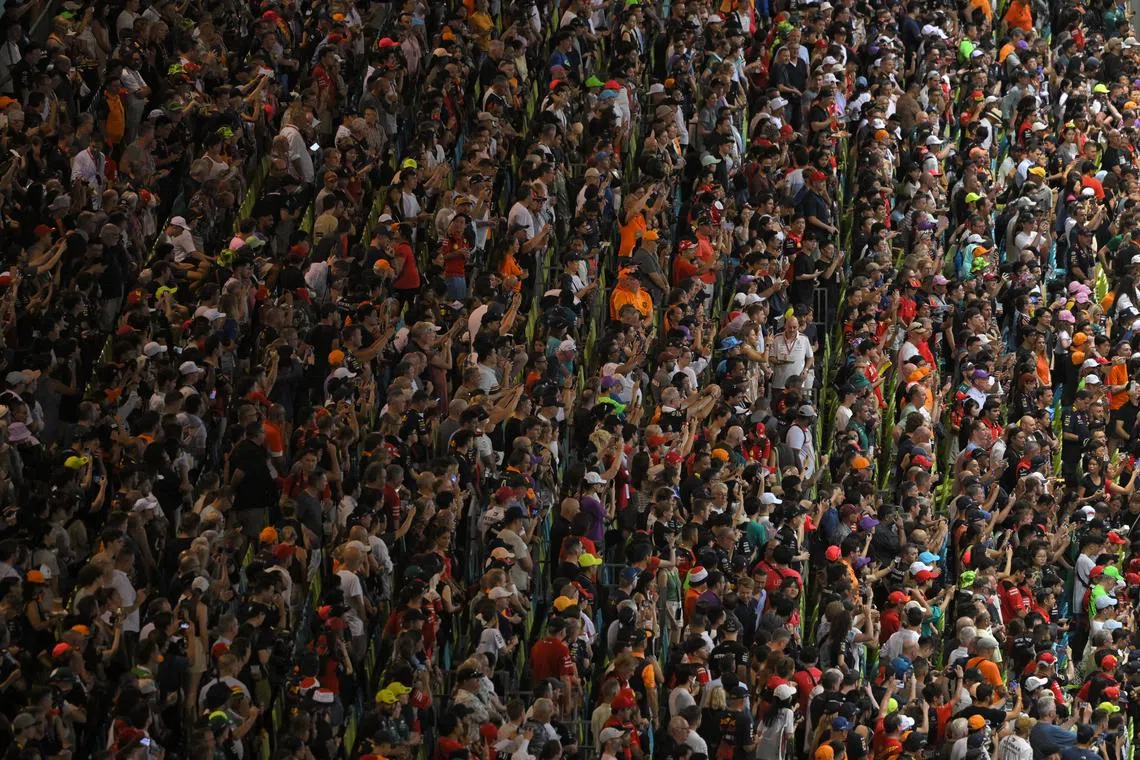 Fans seated in the stands during the the Formula One Singapore Airlines Singapore Grand Prix at Marina Bay street circuit on Sept 17.