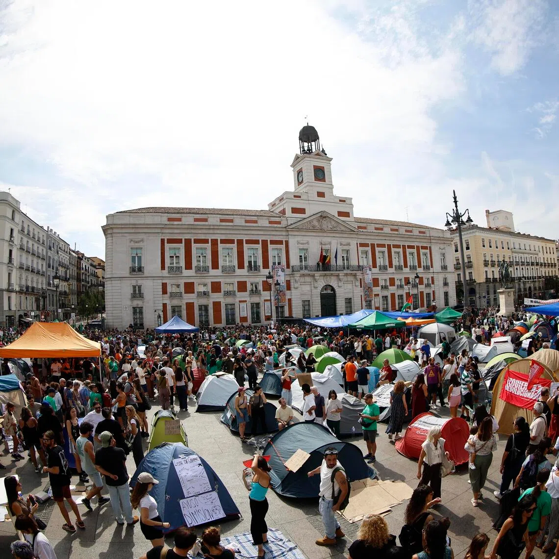 Hundreds of protesters on the weekend set up tents in Madrid’s busy Puerta del Sol public square to press their demands.