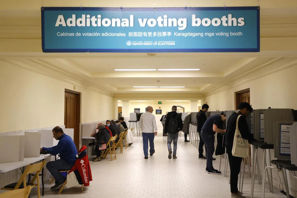 Voters at the voting center inside San Francisco City Hall in California on Nov 8, 2022.