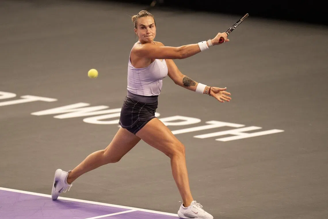 Aryna Sabalenka returns a shot during her match against Ons Jabeur on day one of the WTA Finals on Oct 31, 2022.