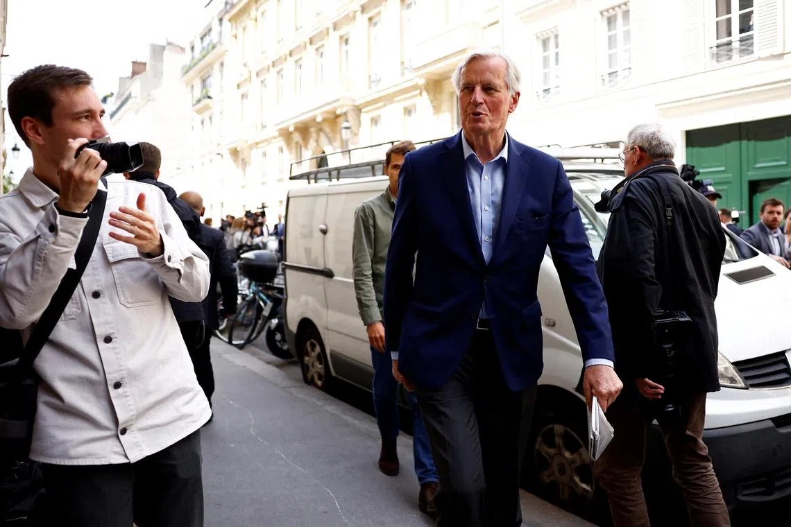 FILE PHOTO: Michel Barnier of the French conservative party Les Republicains (The Republicans - LR) arrives to attend an emergency meeting called by LR party chiefs in Paris, following their leader Eric Ciotti's decision to form an alliance between his party's candidates and the far-right National Rally (Rassemblement National - RN) in a snap parliamentary election, France, June 12, 2024. REUTERS/Sarah Meyssonnier/File Photo