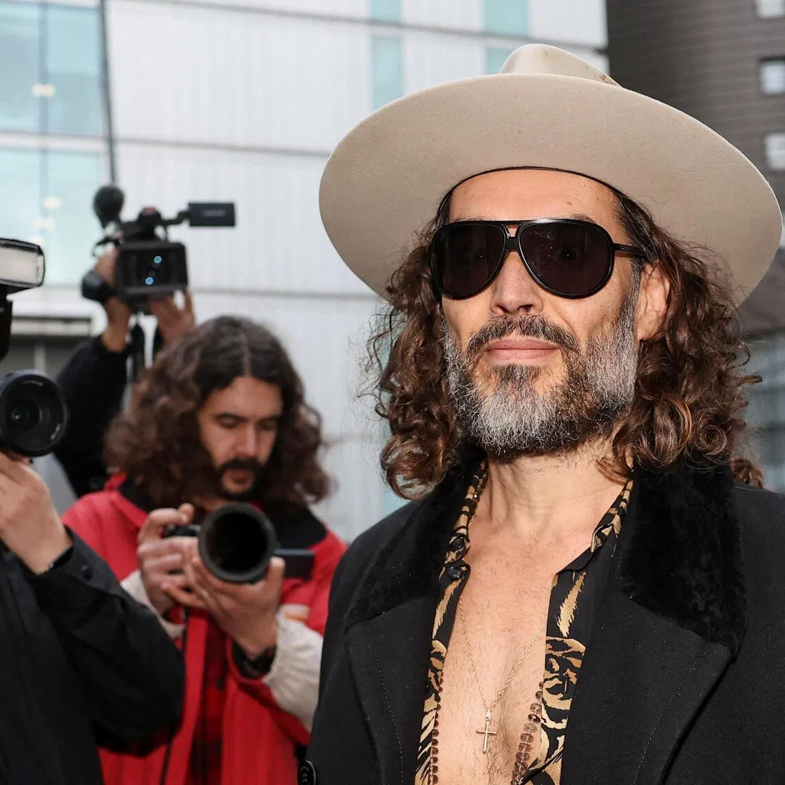 Actor-comedian Russell Brand arrives in court after further charges were added to his rape and multiple sexual assault case in London, Britain on Feb 24, 2026. 