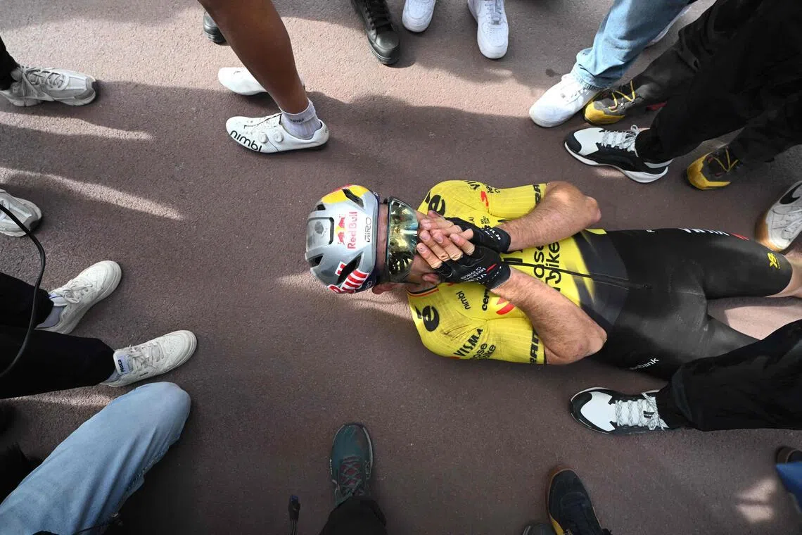 Team Visma-Lease a Bike's Belgian rider Wout van Aert celebrates winning the 123rd edition of the Paris-Roubaix one-day classic cycling race at the Velodrome Andre-Petrieux in Roubaix, northern France, on April 12, 2026.