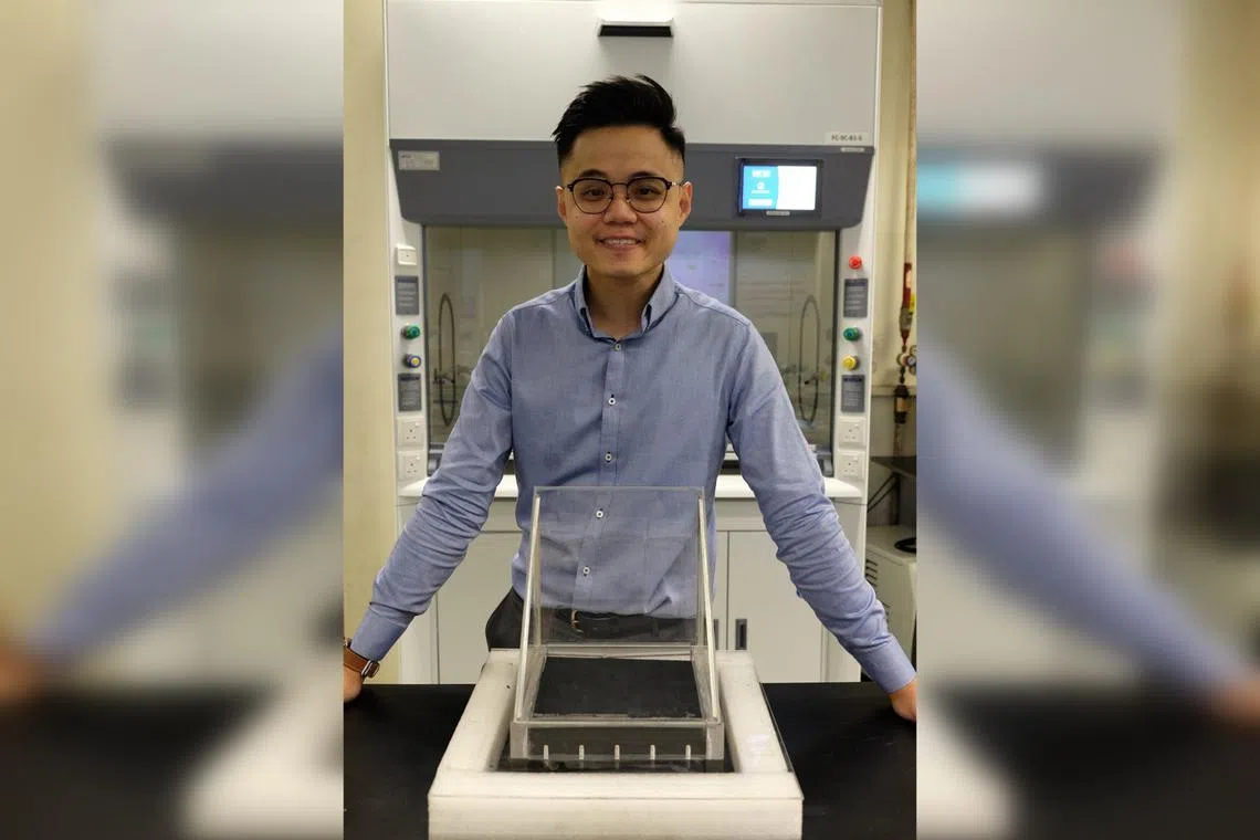 Dr Edison Huixiang Ang with his solar still, which uses MXenes synthesized from plastic waste