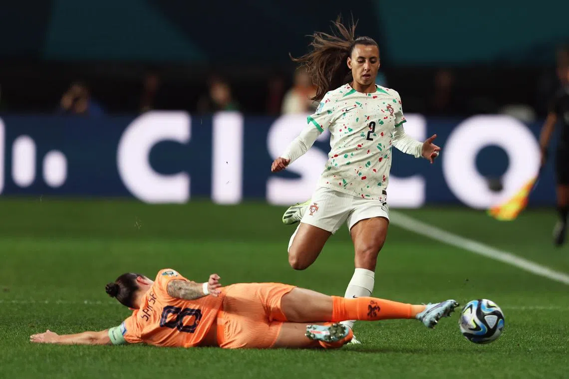 Sherida Spitse of the Netherlands in action against Catarina Amado of Portugal during their Women's World Cup match.