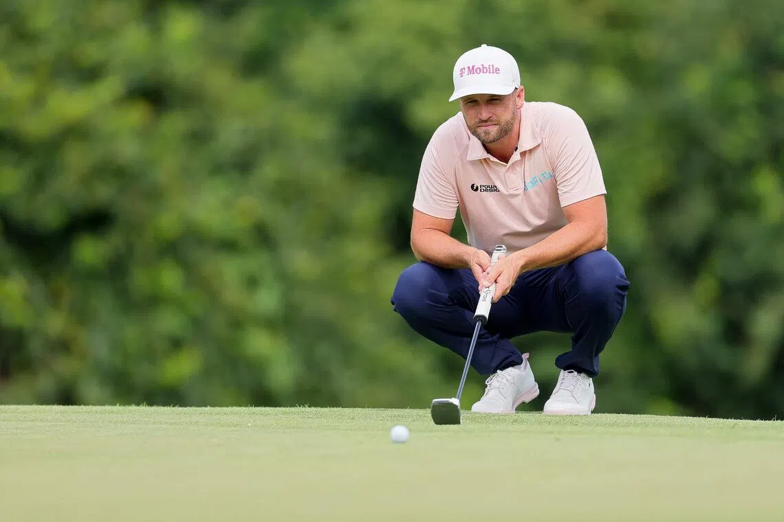 Wyndham Clark lining up a putt on the 13th green during the final round of the BMW Championship on Aug 23.